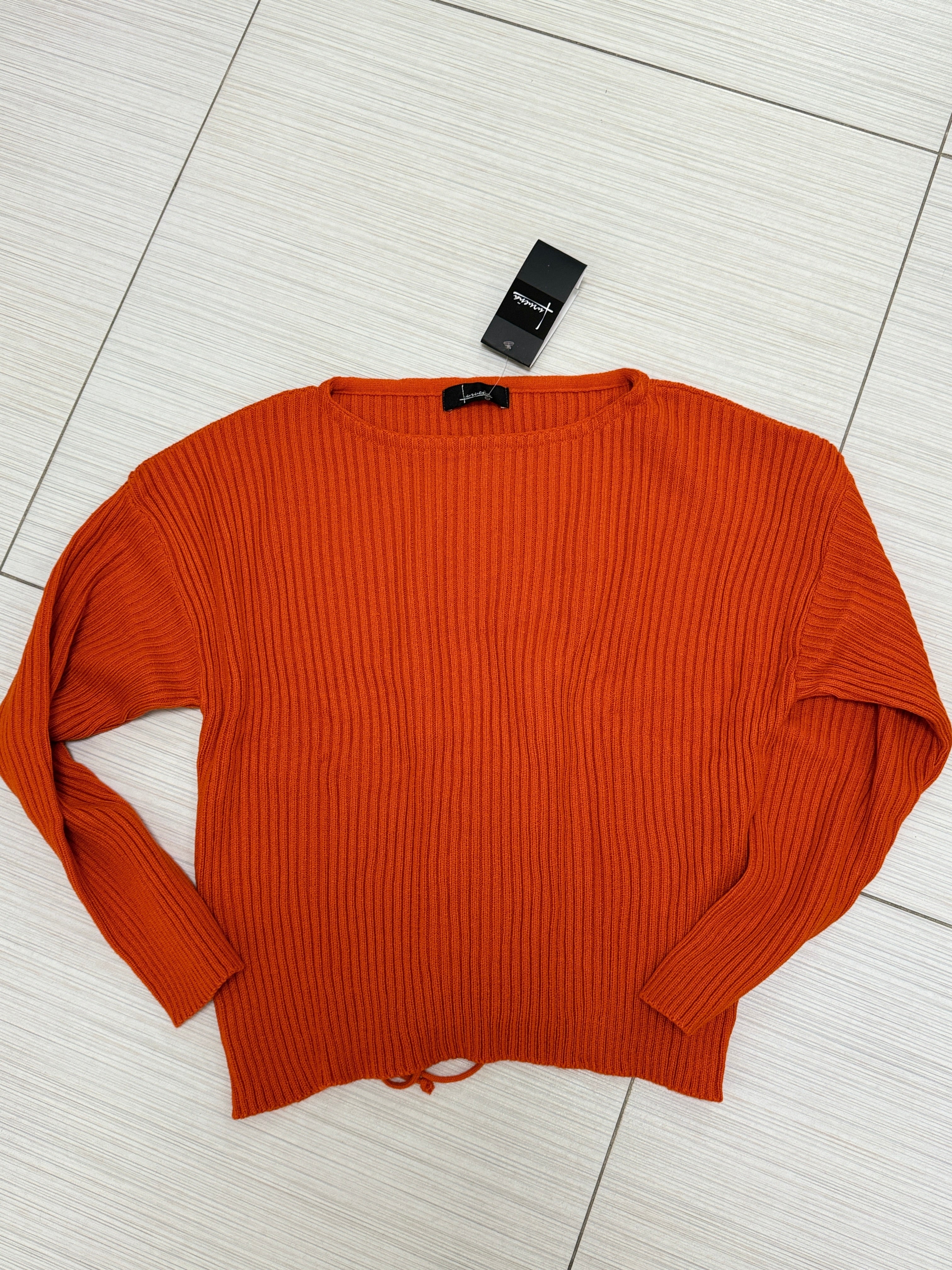 SUÉTER TEJIDO NARANJA/NEGRO L33339