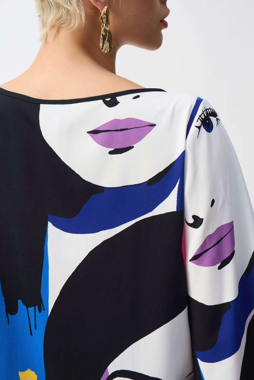 BLUSA BLANCA ESTAMPADA CARAS 251148