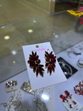 ARETES ROJOS