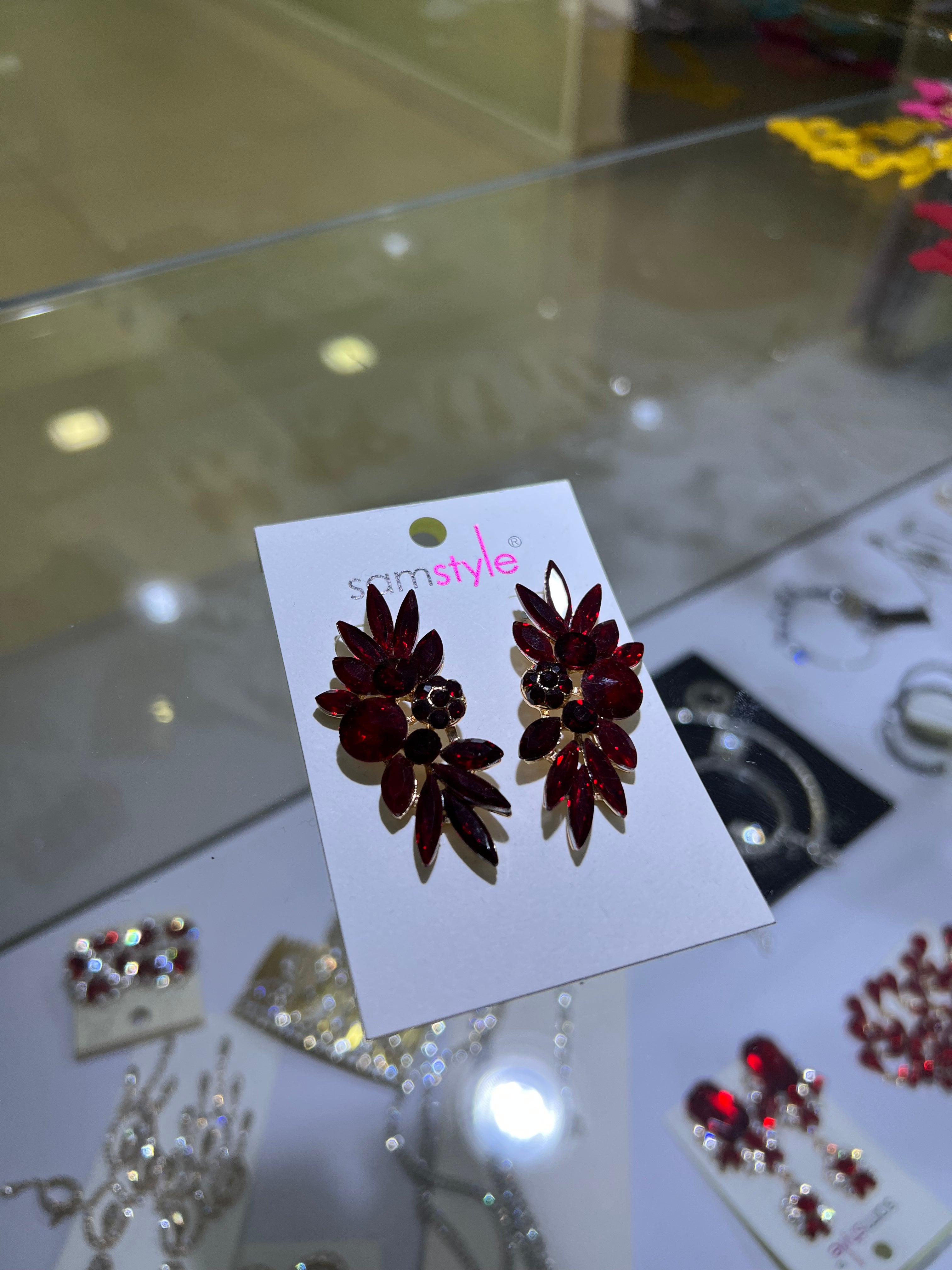 ARETES ROJOS