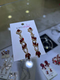 ARETES DORADOS Y ROJO