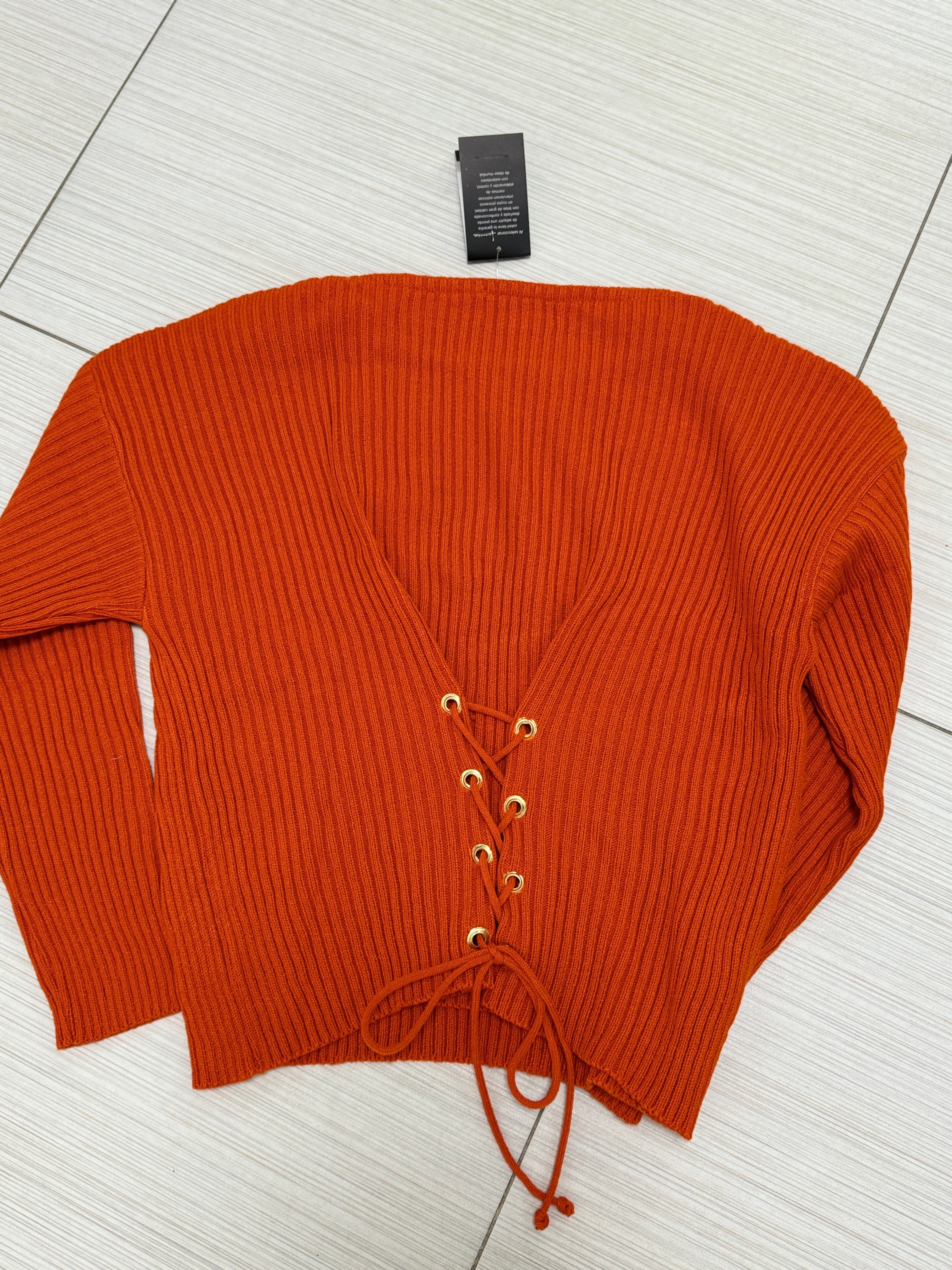 SUÉTER TEJIDO NARANJA/NEGRO L33339