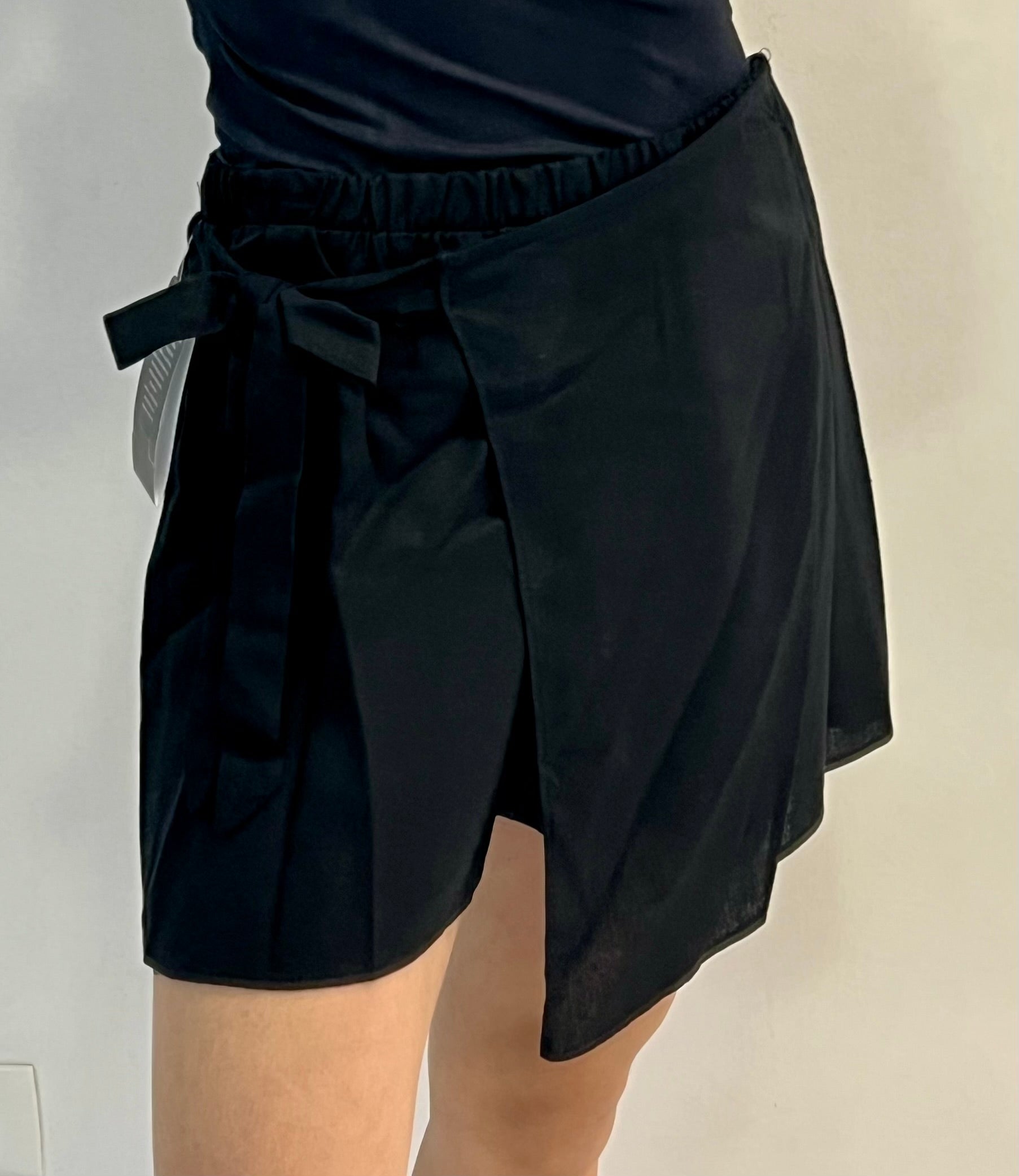 FALDA SHORT NEGRO/VERDE/CAMEL L35286