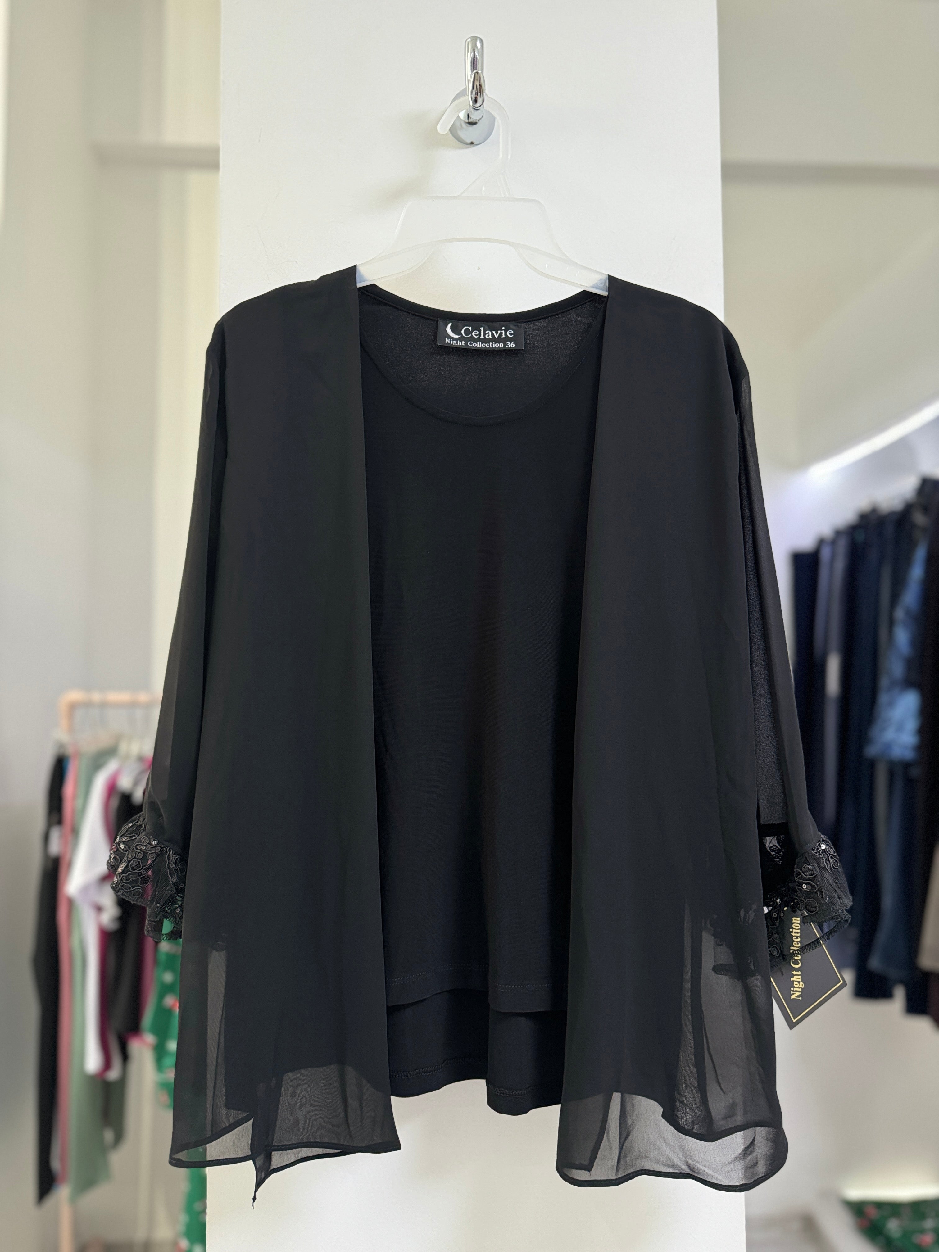 BLUSA NEGRA ENCAJE EN PUÑO 9000