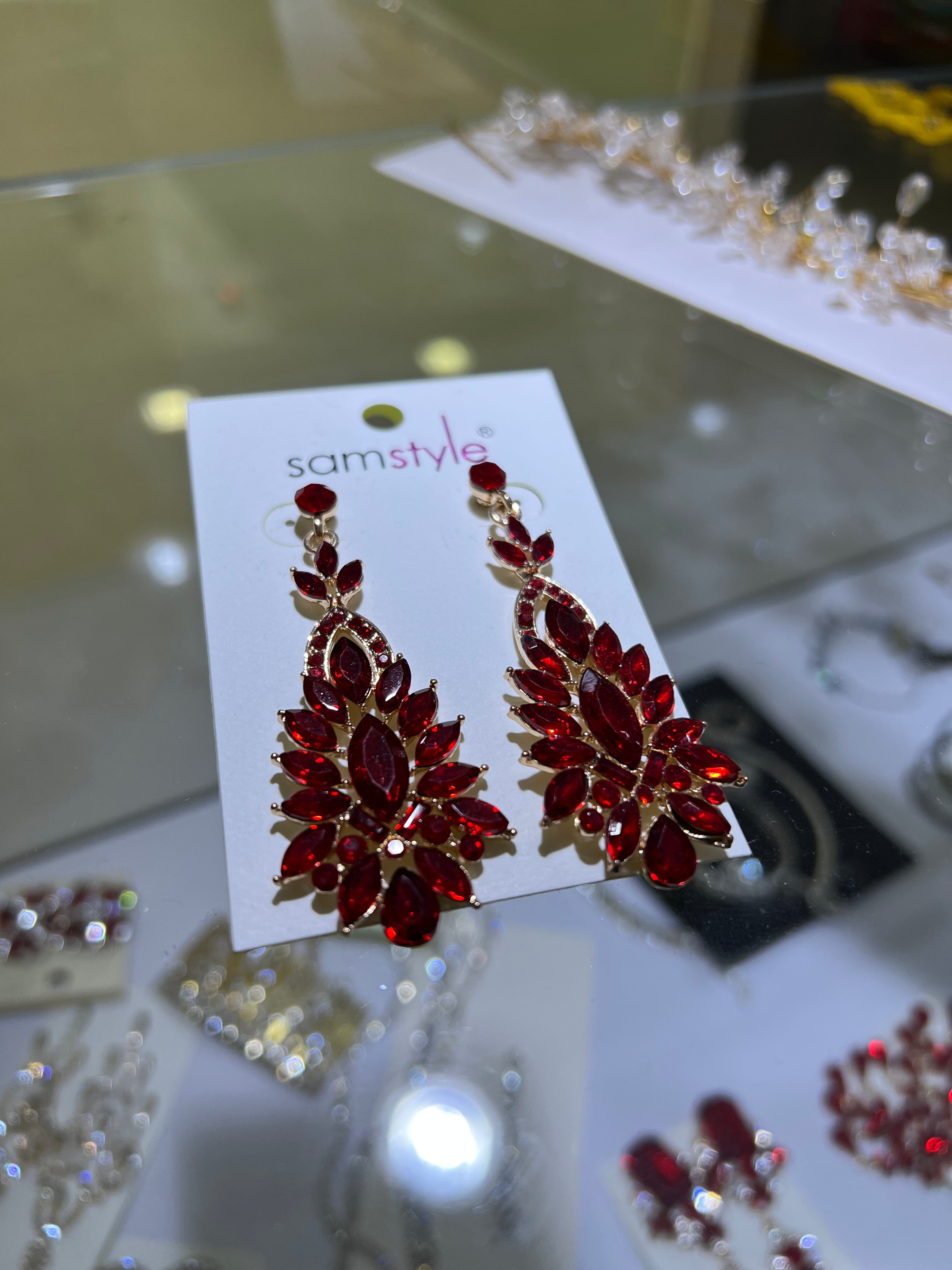 ARETES ROJOS