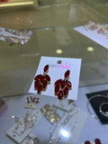 ARETES ROJOS