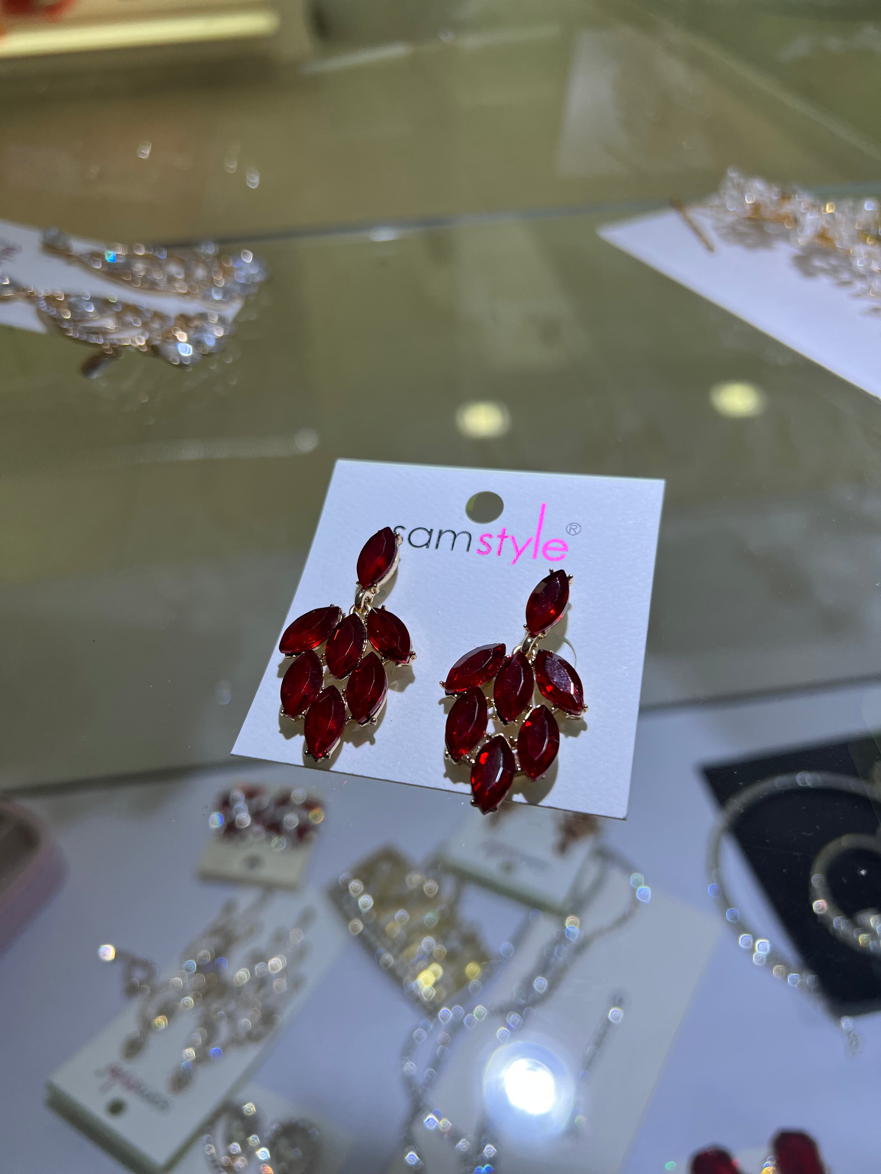 ARETES ROJOS