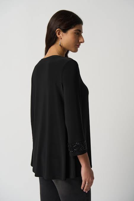 BLUSA NEGRA MANGA BORDADA